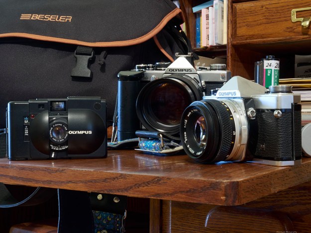 My old OM-1 and OM-2, along with the XA "point and shoot"